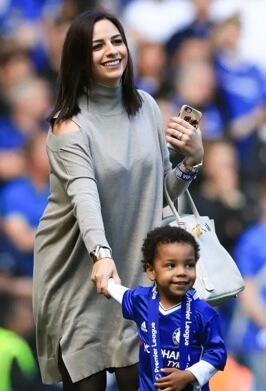 Sandra Zouma with her son.